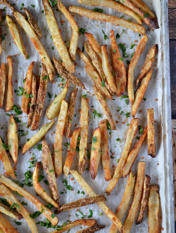 Accompany those summer burgers with these crispy and healthier Oven Baked Parmesan Fries. You won't believe the crunch!